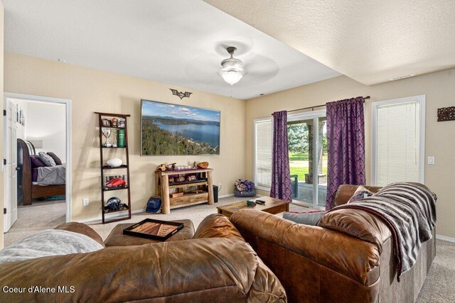 740 N Dundee Dr, Post Falls, ID 83854 - living room featuring carpet floors and a ceiling fan
