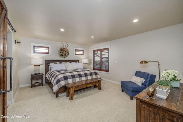 8718 W Sausser Dr, Coeur Dalene, ID 83814 - bedroom with light carpet and recessed lighting