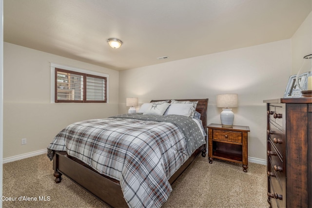 8718 W Sausser Dr, Coeur Dalene, ID 83814 - carpeted bedroom with baseboards