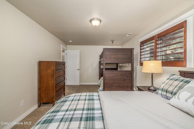 8718 W Sausser Dr, Coeur Dalene, ID 83814 - carpeted bedroom with baseboards