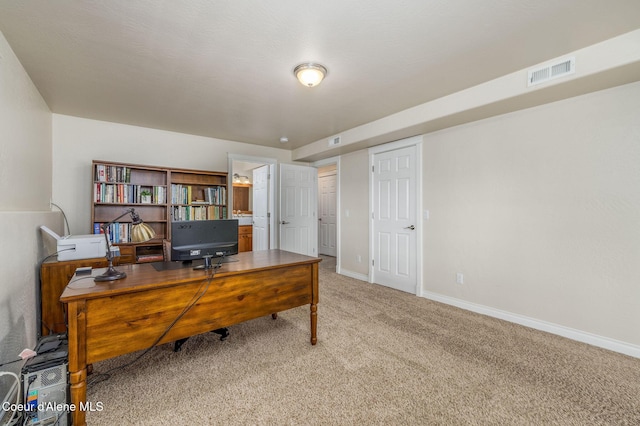 8718 W Sausser Dr, Coeur Dalene, ID 83814 - home office with carpet flooring and baseboards