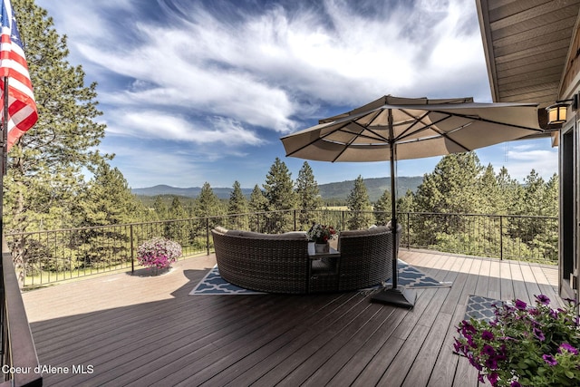 8718 W Sausser Dr, Coeur Dalene, ID 83814 - wooden deck featuring a mountain view