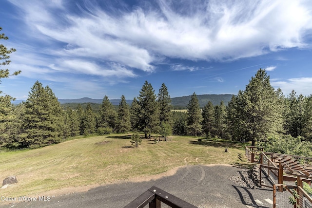 8718 W Sausser Dr, Coeur Dalene, ID 83814 - view of green lawn featuring a mountain view