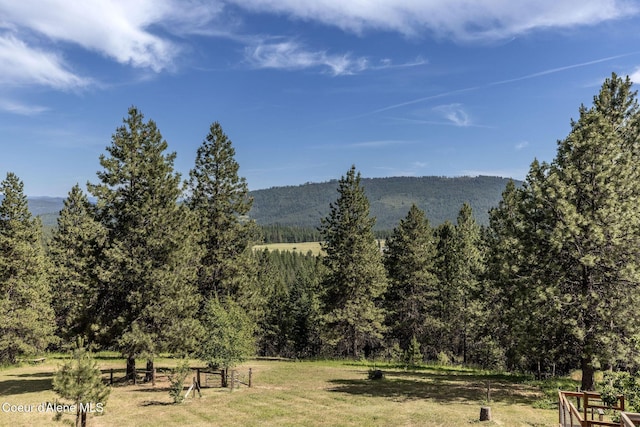 8718 W Sausser Dr, Coeur Dalene, ID 83814 - mountain view featuring a heavily wooded area