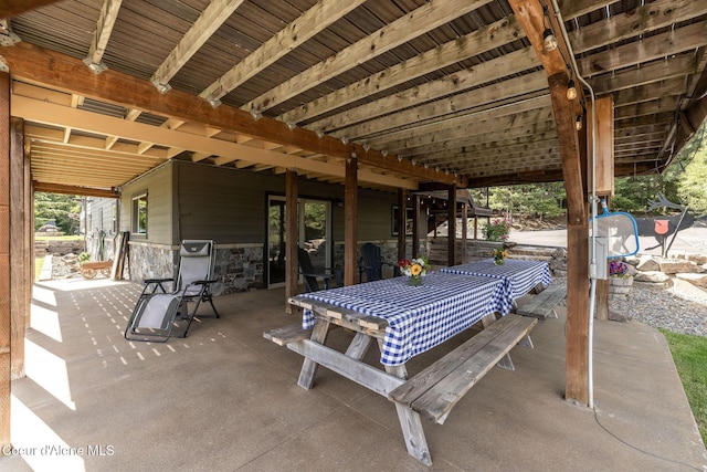 8718 W Sausser Dr, Coeur Dalene, ID 83814 - view of patio / terrace featuring outdoor dining space