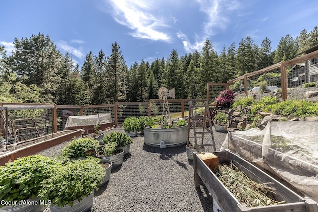 8718 W Sausser Dr, Coeur Dalene, ID 83814 - view of yard featuring a vegetable garden