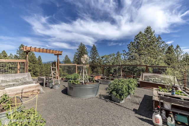 8718 W Sausser Dr, Coeur Dalene, ID 83814 - view of patio / terrace with a vegetable garden