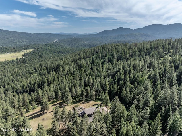 8718 W Sausser Dr, Coeur Dalene, ID 83814 - mountain view featuring a heavily wooded area