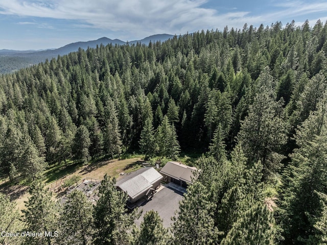 8718 W Sausser Dr, Coeur Dalene, ID 83814 - aerial view of property and surrounding area with a forest
