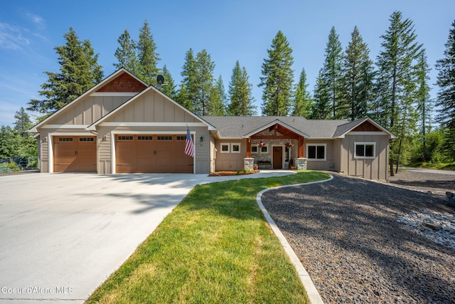 80 Parkland Dr, Blanchard, ID 83804 - craftsman house featuring board and batten siding, an attached garage, concrete driveway, and covered porch