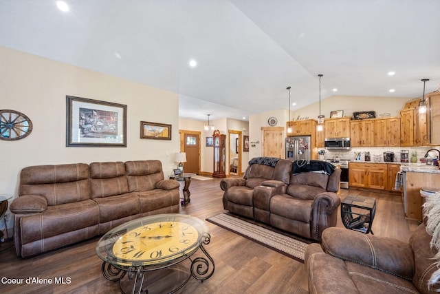 80 Parkland Dr, Blanchard, ID 83804 - living area featuring lofted ceiling, wood finished floors, and recessed lighting