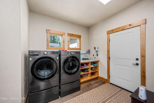 80 Parkland Dr, Blanchard, ID 83804 - laundry area featuring washing machine and dryer and wood finished floors