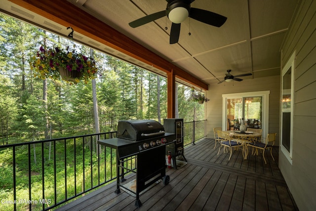 80 Parkland Dr, Blanchard, ID 83804 - wooden terrace featuring a ceiling fan, grilling area, and outdoor dining area