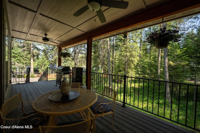80 Parkland Dr, Blanchard, ID 83804 - wooden terrace featuring ceiling fan, grilling area, and view of wooded area