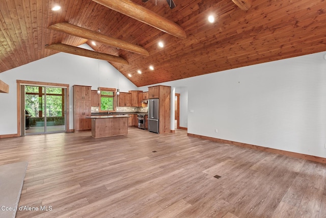 357 Odonnell Dr, Dover, ID 83825 - kitchen featuring open floor plan, premium appliances, a center island, brown cabinets, and recessed lighting