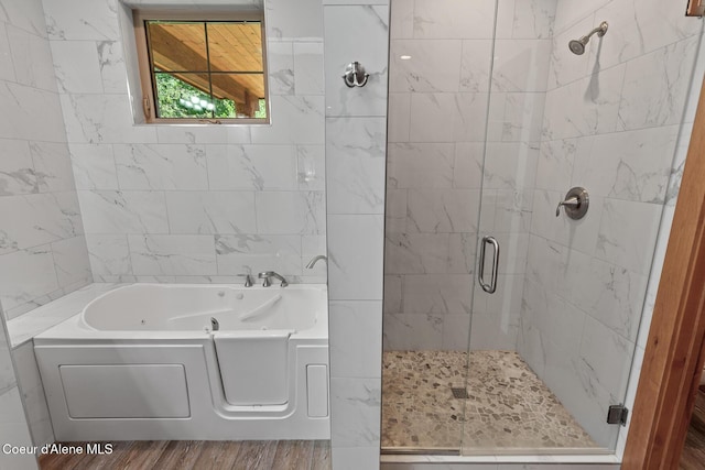 357 Odonnell Dr, Dover, ID 83825 - full bathroom with a garden tub, a shower stall, and wood finished floors