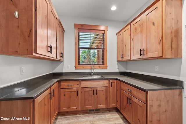 357 Odonnell Dr, Dover, ID 83825 - kitchen with dark countertops, light wood-style floors, and recessed lighting