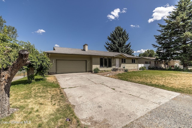 6300 N Sunrise Ter, Coeur Dalene, ID 83815 - ranch-style house featuring a garage, driveway, a front lawn, and a chimney
