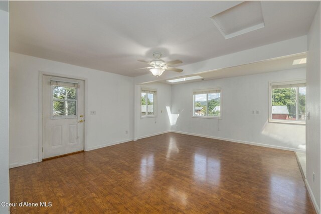 6300 N Sunrise Ter, Coeur Dalene, ID 83815 - unfurnished room with wood finished floors, attic access, and ceiling fan
