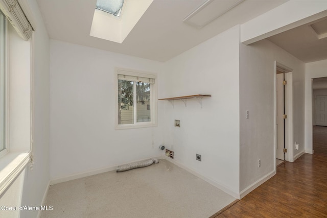 6300 N Sunrise Ter, Coeur Dalene, ID 83815 - laundry room featuring electric dryer hookup, hookup for a washing machine, and a skylight