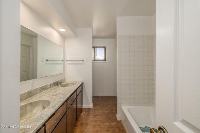 6300 N Sunrise Ter, Coeur Dalene, ID 83815 - bathroom with a tub, double vanity, wood finished floors, a shower, and recessed lighting