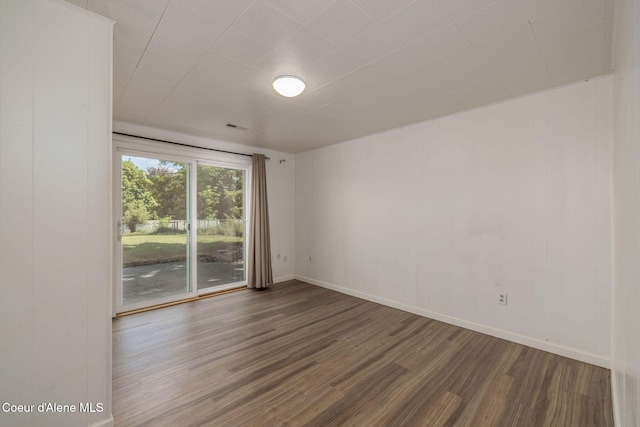 6300 N Sunrise Ter, Coeur Dalene, ID 83815 - empty room featuring wood finished floors and baseboards