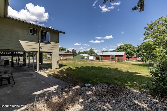 6300 N Sunrise Ter, Coeur Dalene, ID 83815 - view of grassy yard with a patio and stairway