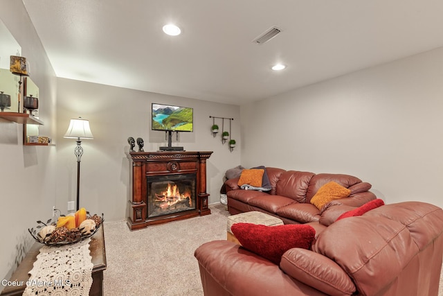 709 E 14th Ave, Post Falls, ID 83854 - living room with carpet, recessed lighting, and a glass covered fireplace