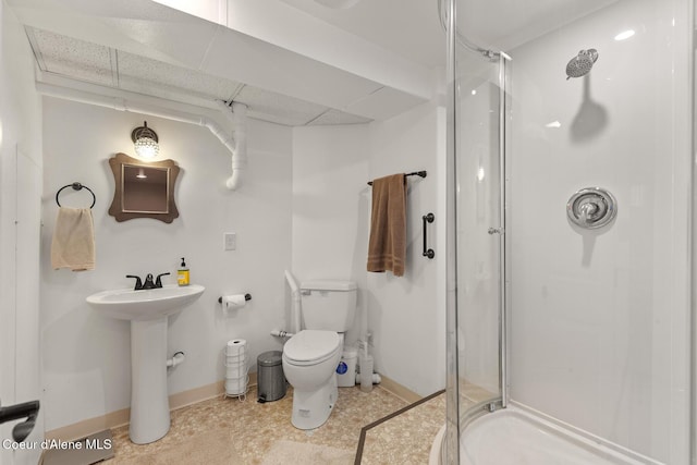 709 E 14th Ave, Post Falls, ID 83854 - full bathroom featuring a stall shower and a paneled ceiling