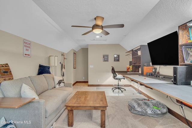 20770 N Penobscot Rd, Rathdrum, ID 83858 - carpeted living area with a ceiling fan, lofted ceiling, and an office area