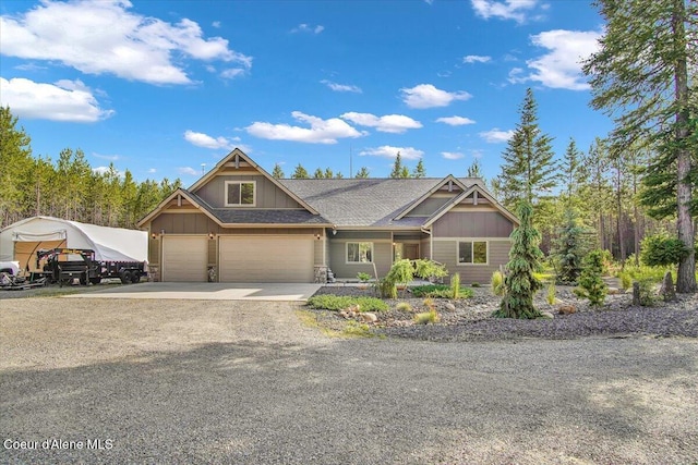 20770 N Penobscot Rd, Rathdrum, ID 83858 - craftsman house with driveway, board and batten siding, and stone siding