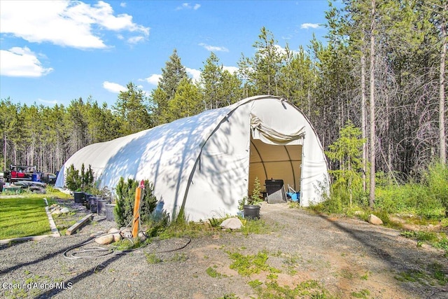 20770 N Penobscot Rd, Rathdrum, ID 83858 - view of pole building featuring a view of trees