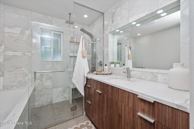 1217 E Montana Ave, Coeur Dalene, ID 83814 - full bath featuring a marble finish shower, vanity, and recessed lighting