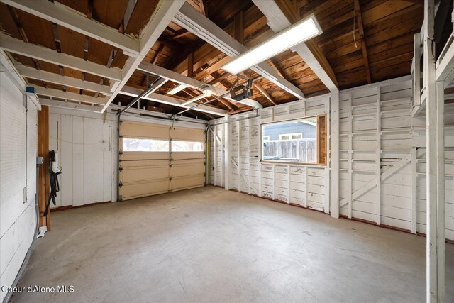1217 E Montana Ave, Coeur Dalene, ID 83814 - garage featuring a garage door opener