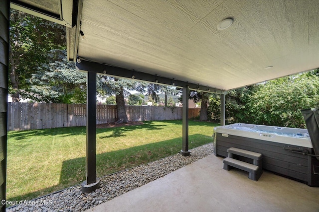 1217 E Montana Ave, Coeur Dalene, ID 83814 - fenced backyard with a hot tub and a patio