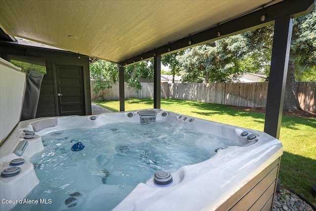 1217 E Montana Ave, Coeur Dalene, ID 83814 - fenced backyard featuring a hot tub