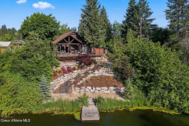 11 Canoe Cv, Dover, ID 83825 - rear view of house with a water view