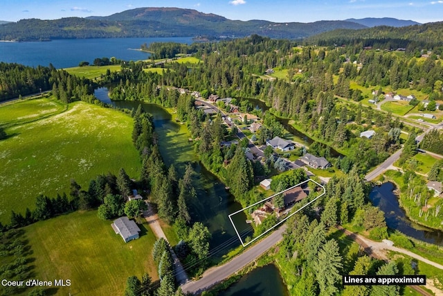 11 Canoe Cv, Dover, ID 83825 - aerial overview of property's location with property parcel outlined and a water and mountain view