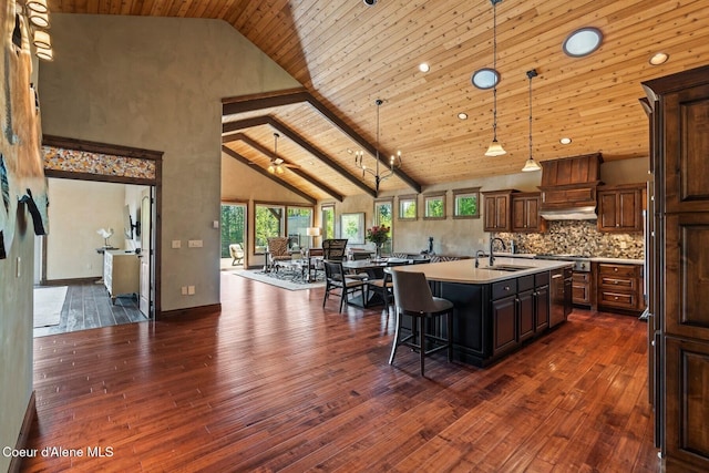 11 Canoe Cv, Dover, ID 83825 - kitchen with light countertops, dark wood-style floors, high vaulted ceiling, open floor plan, and wooden ceiling