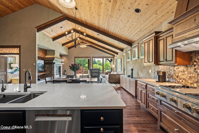 11 Canoe Cv, Dover, ID 83825 - kitchen with open floor plan, wooden ceiling, dark wood-type flooring, stainless steel appliances, and a kitchen island with sink