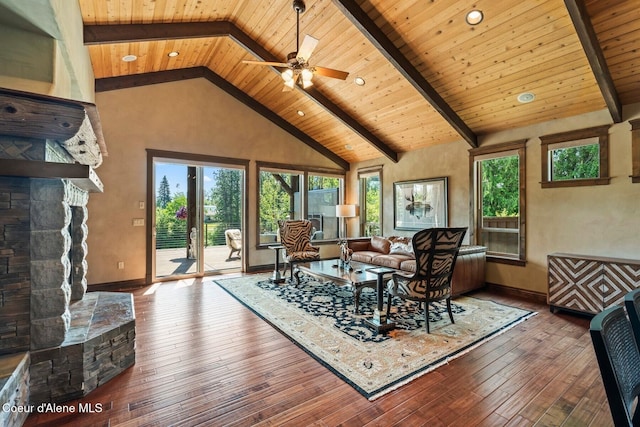 11 Canoe Cv, Dover, ID 83825 - living room with a wood ceiling with exposed beams, wood-type flooring, ceiling fan, a stone fireplace, and high vaulted ceiling