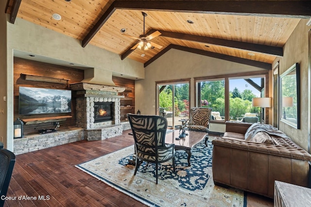 11 Canoe Cv, Dover, ID 83825 - living room featuring a wood ceiling with exposed beams, hardwood / wood-style flooring, a stone fireplace, ceiling fan, and high vaulted ceiling