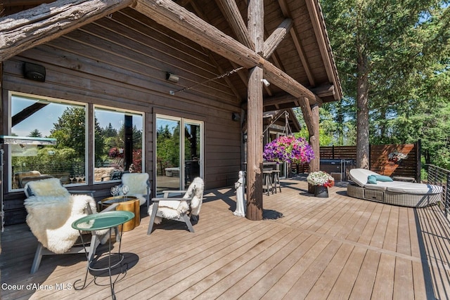 11 Canoe Cv, Dover, ID 83825 - wooden deck with outdoor lounge area