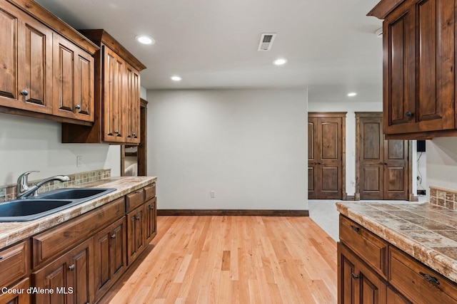 11 Canoe Cv, Dover, ID 83825 - kitchen featuring light wood-type flooring and recessed lighting