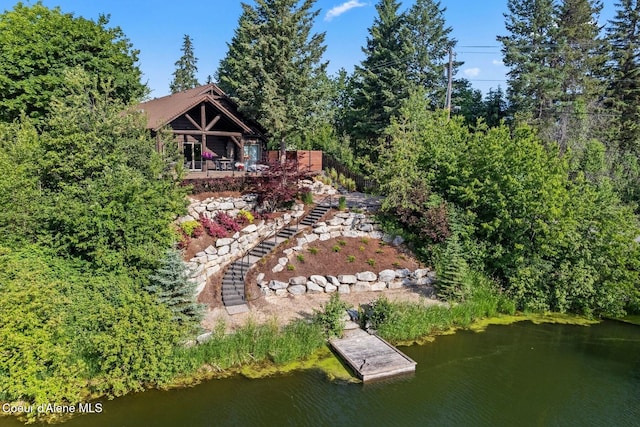 11 Canoe Cv, Dover, ID 83825 - view of yard with a water view and a dock