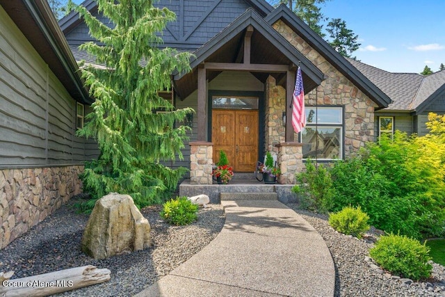 3742 W Cielo View Ct, Coeur Dalene, ID 83814 - property entrance featuring stone siding