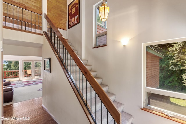 7722 W Clemetson Rd, Coeur Dalene, ID 83814 - stairway with a towering ceiling and wood finished floors