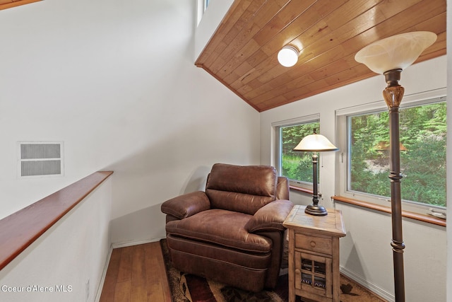 7722 W Clemetson Rd, Coeur Dalene, ID 83814 - living area featuring lofted ceiling, hardwood / wood-style flooring, and wood ceiling