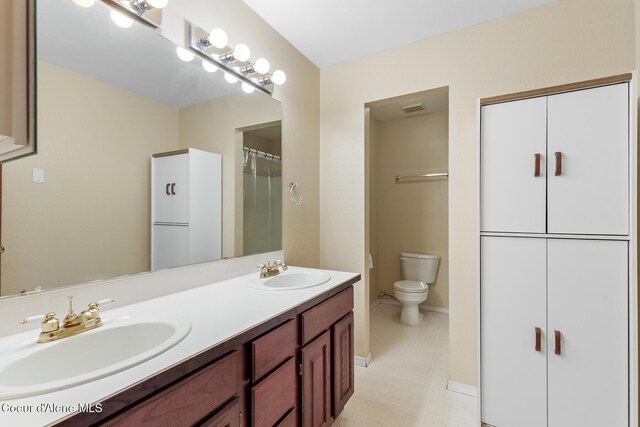 7722 W Clemetson Rd, Coeur Dalene, ID 83814 - full bath featuring double vanity and a shower with shower curtain