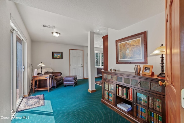 7722 W Clemetson Rd, Coeur Dalene, ID 83814 - living area featuring carpet and baseboards